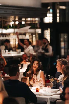 Guests and team at Chic Nonna, editorial light. Food photography in Dubai by Artur Begel