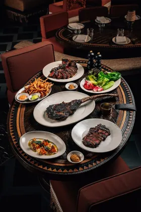 Interior of INA, low key light. Food photography in Dubai by Artur Begel