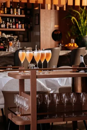Interior of La Famiglia restaurant, low key light. Food photography in Dubai by Artur Begel