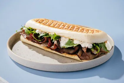 Dish at Al Mukhtar Bakery, hard flash light. Food photography in Dubai by Artur Begel