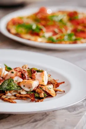 Dish at La Famiglia restaurant, hard flash light. Food photography in Dubai by Artur Begel