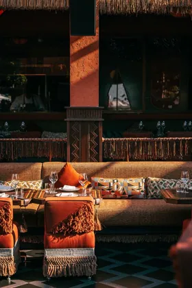 Interior of INA, low key light. Food photography in Dubai by Artur Begel