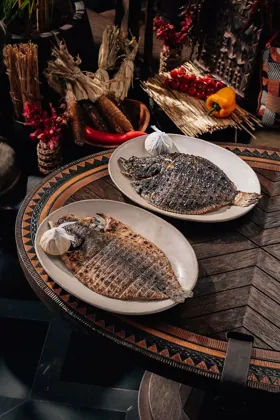 Dish at INA, low key light. Food photography in Dubai by Artur Begel