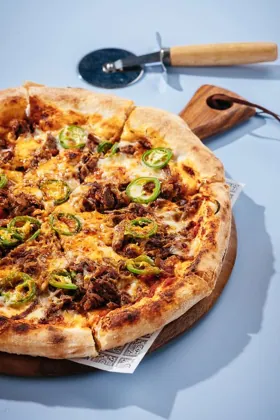 Dish at Al Mukhtar Bakery, hard flash light. Food photography in Dubai by Artur Begel