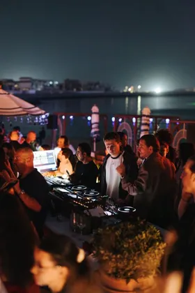 Guests and team at Sirene by Gaia, low key light. Food photography in Dubai by Artur Begel
