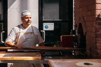 Dish at Al Mukhtar Bakery, low key light. Food photography in Dubai by Artur Begel