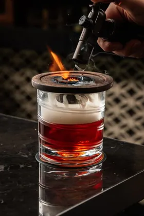 Drink at Attiko, low key light. Food photography in Dubai by Artur Begel