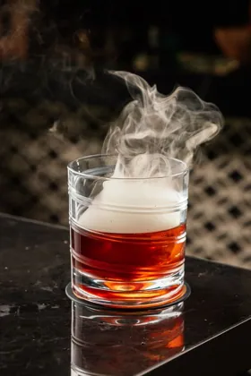 Drink at Attiko, low key light. Food photography in Dubai by Artur Begel